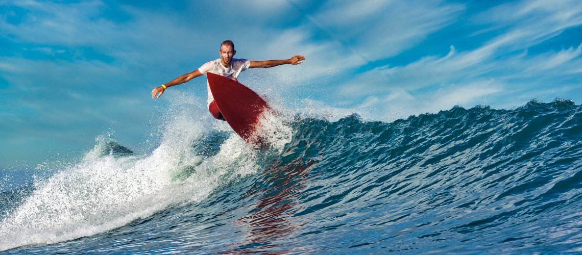 Surfing Man at Hikkaduwa Sri Lanka